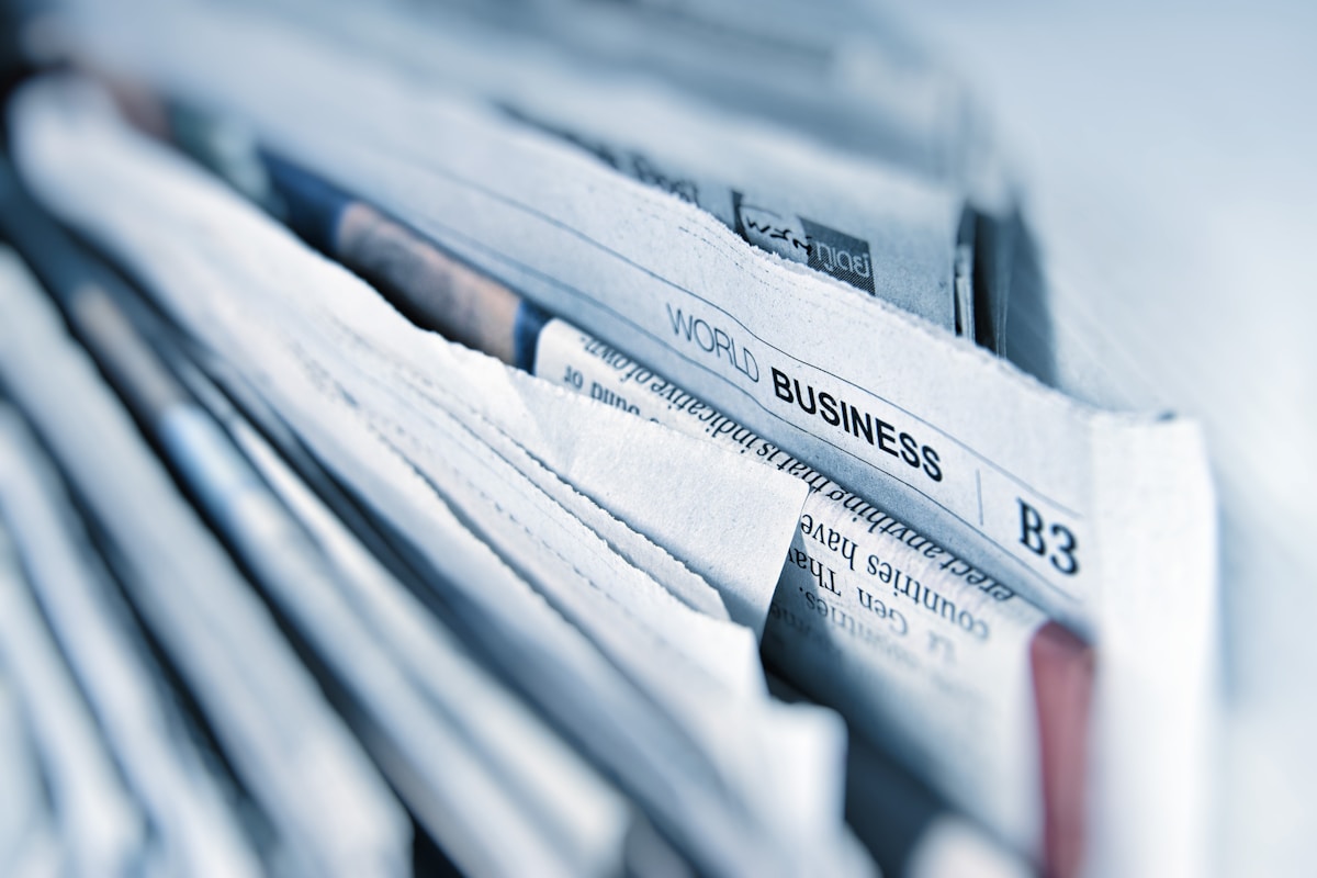 Weird news stories collection showing bizarre newspaper headlines from 2025